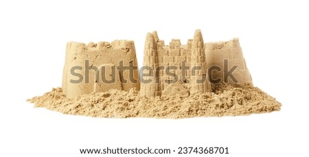 Different beautiful sand castles isolated on white Royalty-Free Stock Photo #2374368701
