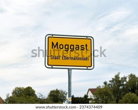 Moggast sign at the entrance of the small municipality as part of Ebermannstadt in Franconia, Germany. German town sign.