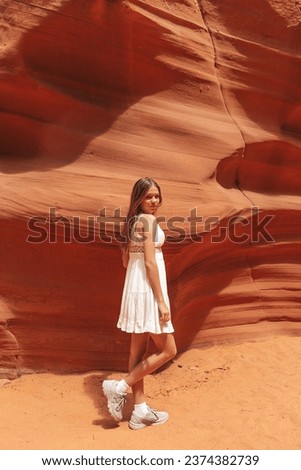 Young girl exploring Antilope Canyon in Arizona, USA. Antilope canyon the most beautiful canyon in USA