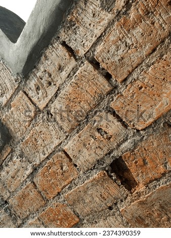 a picture of old brick wall, old texture of redstone blocks closeup