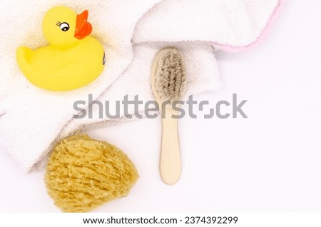 Baby bath items with white background and a rubber duck
