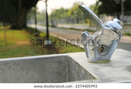 Faucet stainless steel in the park.
