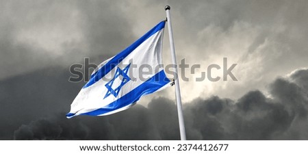 The national flag of the State of Israel .Hamas Attack: Israel Weighs Ground Invasion on Gaza Strip in Risky Strategy Royalty-Free Stock Photo #2374412677
