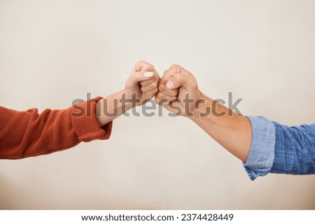 Fist bump, partnership and hands, people in a team with support, celebration and hello, success and solidarity. Synergy, cooperation and trust, agreement and deal with handshake and wall background