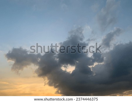 Stratocumulus clouds It is gray and has gaps where the sun's rays can be seen beautifully at Bangkok, Thailand.no focus