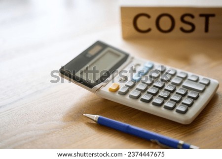 Image of a calculator for calculating costs Royalty-Free Stock Photo #2374447675