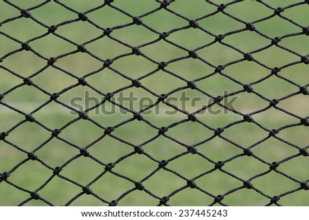 Mesh fence on the pitch softball, softball field background