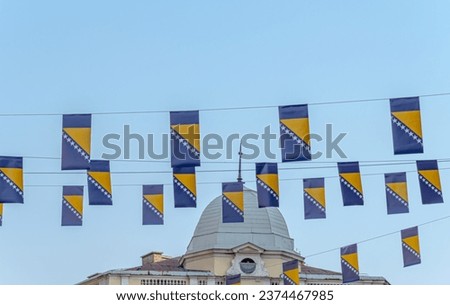 Thousands Bosnian flags on Marsala Tita street for Independence Day Royalty-Free Stock Photo #2374467985