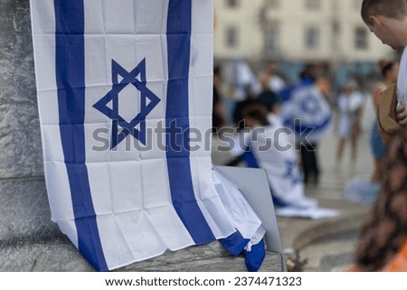 Lisbon, Portugal October 10, 2023. The flag of Israel in close-up on the background of a rally in support of Israel
