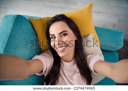 Top high angle view photo of positive cheerful millennial girl have nap awake make selfie for life blog in house apartment