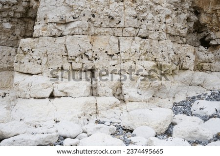 White cliffs background at Cuckmere Haven beach in Hope Gap. Located between Eastbourne and Seaford in East Sussex, UK Royalty-Free Stock Photo #2374495665