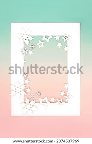 Christmas white snowflake star decorations abstract on white frame and pink green gradient background. North pole theme for the holiday season.