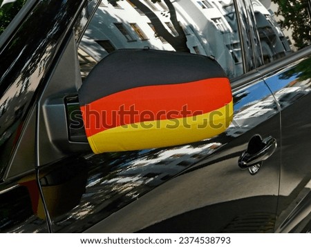 Outside mirror in black-red-and-gold, the German national flag