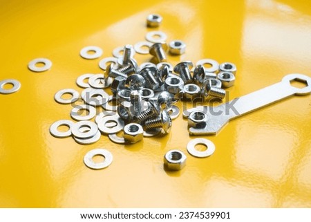 Phillips Pan Head Screw and Hex Nuts and flat washer on metal sheet ,