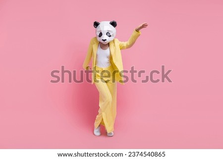 Full size photo of overjoyed 3d panda mask elegant girl have good mood dancing isolated on pink color background