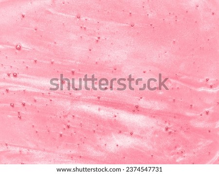 Pink lip gloss texture background. Smudged cosmetic product smear. Makup swatch product sample Royalty-Free Stock Photo #2374547731