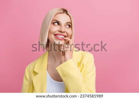 Photo of gorgeous cheerful lady finger touch lips look empty space imagine isolated on pink color background