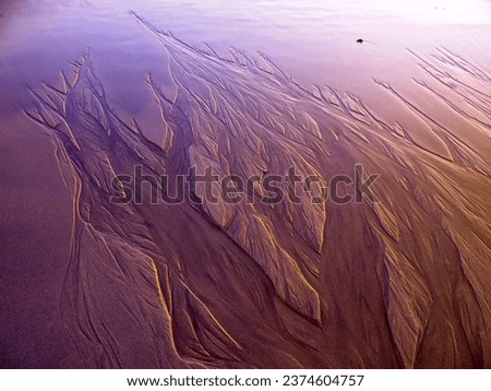 Visual metaphors about sand- Matosinhos Royalty-Free Stock Photo #2374604757
