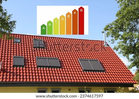 Energy label on a house in the background Royalty-Free Stock Photo #2374617597