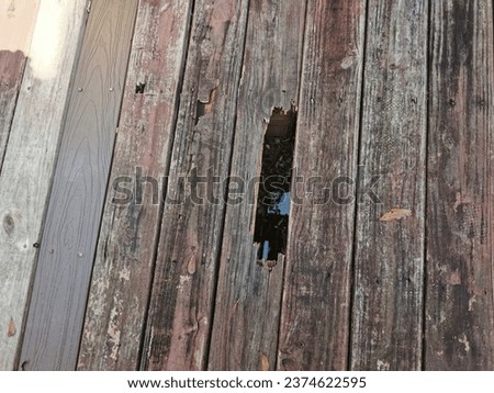 Declination of old wooden balcony or platform. Royalty-Free Stock Photo #2374622595