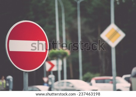 road signs and lines on asphalt - retro, vintage style look