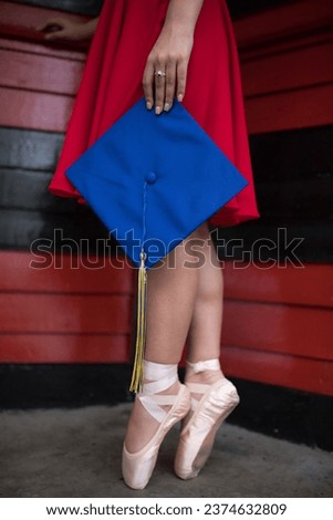 A ballet dancer pointed her shoes for graduation.