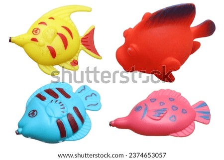 various types of children's fish toys isolated white background.  children, fish toys