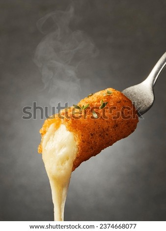 Selective focus of close up image Mozzarella stick with cheese  Royalty-Free Stock Photo #2374668077