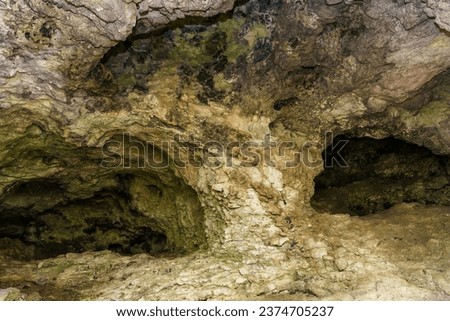 Karst cave. Background with selective focus and copy space for text.