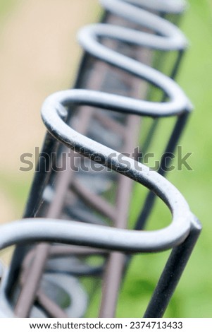 A metal fence with beautiful curves