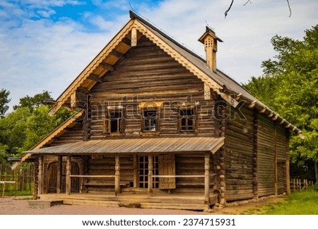 Vitoslavlitsy, Veliky Novgorod, old wooden house in Russian style Royalty-Free Stock Photo #2374715931