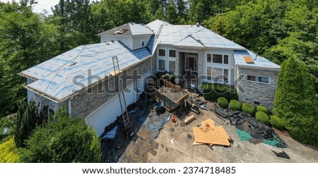 Residential Roof Replacement - Drone View Royalty-Free Stock Photo #2374718485