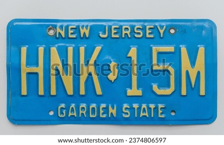 New Jersey Garden State licence plate from the 90's. Vintage, retro. Royalty-Free Stock Photo #2374806597