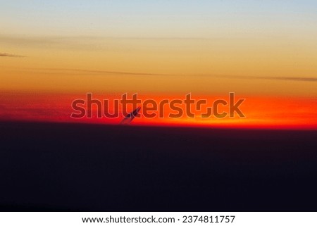 the time of sunrise and the movement of a plane while flying to the east and from the cockpit of another plane