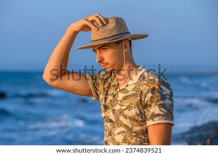 young man in a hat on the mediterranean sea cyprus island 2