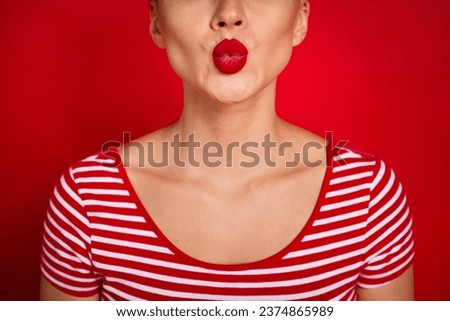 Close up cropped photo of young attractive girl romantic want kiss you lovely blow air coquette mood isolated on red color background