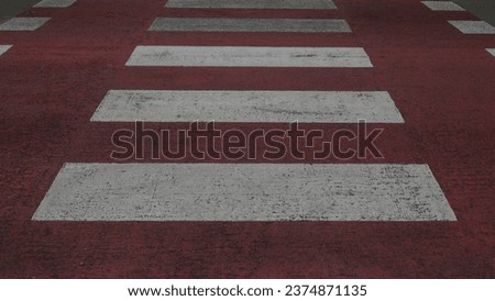 Red and white road crossing in sunlight
