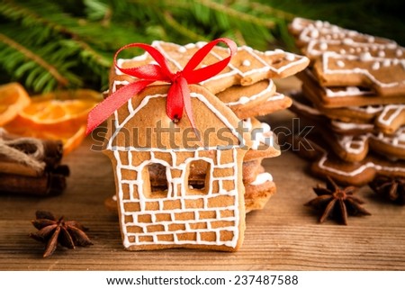 Christmas gingerbread cookies on a rustic wooden table