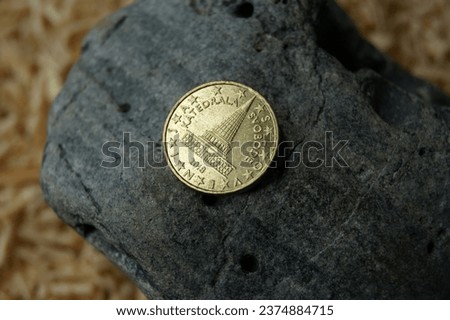 The reverse of the Slovenian 10 euro cent coin with the cathedral of freedom. Eurozone money. Royalty-Free Stock Photo #2374884715
