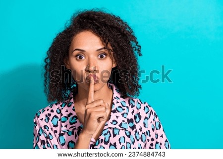 Photo of concentrated quiet girl wear trendy clothes hand touch mouth shh shut up dont say anything isolated on cyan color background