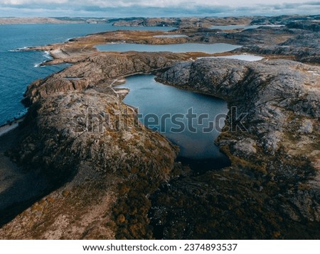 Caldera. Photo from the drone. The coast of the Barents Sea, lake, rocks, rocks. Landscape. Teriberka