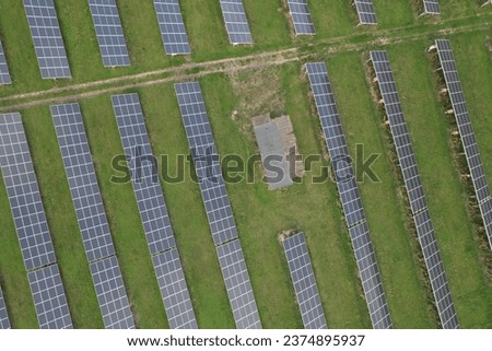 Aerial photo of solar power plant. Many solar energy panels in countryside from above. Photovoltaic power station near Prague, Czech republic, European union.Renewable energy sources-green deal
