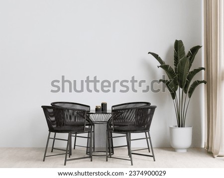Dining room and kitchen,black metal table set copy space on white wall background, front view