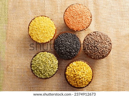 Top view of uncooked pulses and legume in bowl Royalty-Free Stock Photo #2374912673