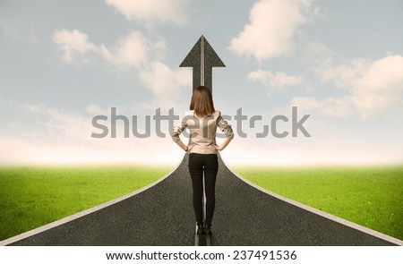 Business woman lokking at 3d road with up arrow concept
