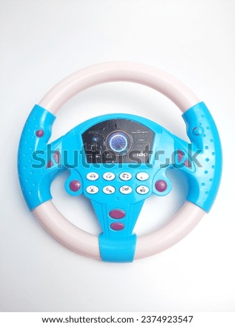 Toy car steering wheel for children playing in isolation on white background. Make children happy with various buttons that produce various sounds