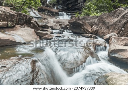 Beautiful of Soi Sawan Waterfall Pha Taem National Park, Ubon Ratchathani, Thailand. Royalty-Free Stock Photo #2374939339