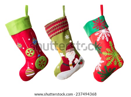 Three Christmas stockings isolated on white background