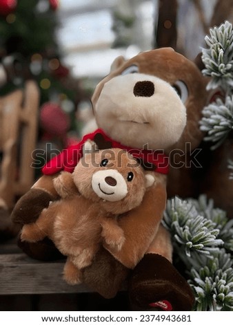Soft toys bears near the Christmas tree
