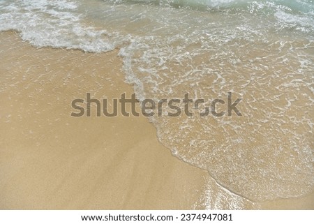 Abstract sandy beach and soft wave background Concept of traveling in Thailand, Phuket